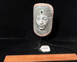 A224 - $125. Michael Barnes: Porcelain Face. Measures 3.5" x 6". 