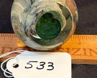 A533 - $95. Paperweight - looks like sterling silver tipped. Signed. Illegible. Measures 2" x 11" tall. 