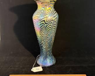 A92 - $125. Lundberg Studios. 2011. Signed Art Glass Vase. Measures 5" x 12" tall. 