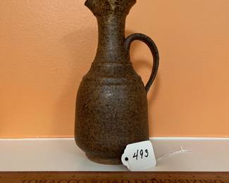 A493 - $25. Brown Speckled Pitcher - Signed CAM? Measures 4" x 8.5" tall. 