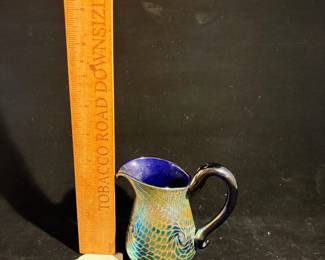 A227 - $85. Gilvey Fish Scale Art Glass Pitcher. Measures 5" x 4" tall. 