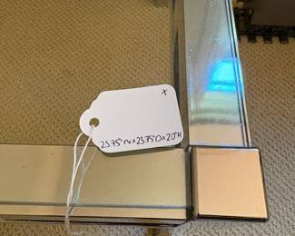 F10 - $125. Milo Baughman sytle Chrome & Glass Side Table. Measures 23.75"square x 20" tall. 