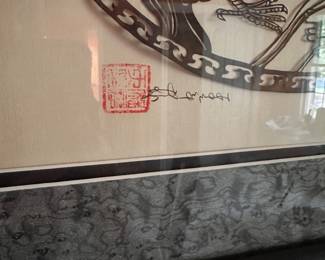 A675 - $35. Dragon Wall Art. Measures 22" x 18". 
