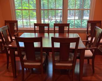 F11 - $350. Dining Room Table with 8 Chairs. Very good condition. Measures 60" x 42" x 31.5". Has 1 - 18" leaf. Some chairs have staining on the seats. 