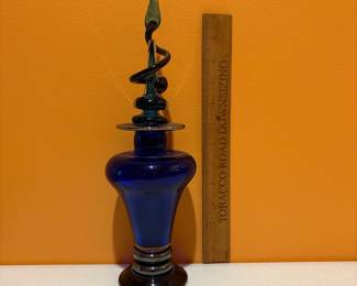 A236 - $75. Glass Perfume Bottle.  Cobalt With Swirl Lid. Measures 4" x 13.5" tall. 