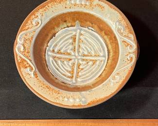 A492 - $25. Brown and Blue Footed Bowl With Handles. Unsigned. Measures 8.5" x 3" tall. 