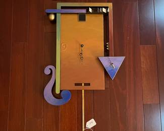 A114 - $55. Christopher Studio: Multicolor Clock. Measures 15.5" x 24.5".