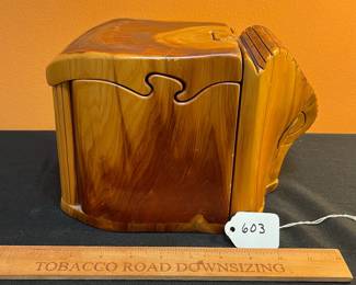 A603 - $50. D. Rupard Wooden Puzzle Box. Measures 6.25" w x 9.5" d x 7" tall
