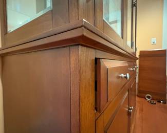 F1 - $250. Lighted China Cabinet. Moves in 2 pieces. Measures 56“ x 18.5” x 81” tall.