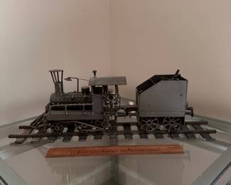 A186 - $75. Locomotive Train Sculpture, all metal construction. Unsigned. Measures 21.5" x 4.5" x 7.5" tall. 