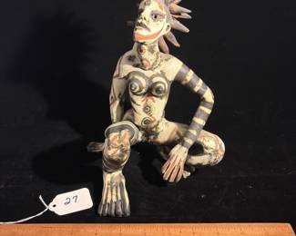 A27 - $40. Karen Scholomberg : "Windchild" Sculpture. AS IS. Leg has been repaired. Measures 5.5" x 9.5" tall. 