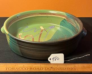 A486 - $30. Kathleen LeSueur. Large Pottery Bowl with Handles - Measures 13.5" x 3" tall. 