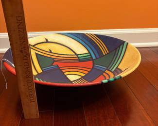 A166 - $200. Terry Habeger : Multi Colored Acrylic on Clay Plate. Measures 17.75" x 4.25" tall. 