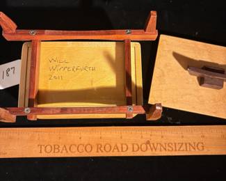 A187 - $40. Will Wipperfurth. Will's Woodworking: Paduk And Maple Box. Measures 6" x 4" x 6.25" tall.