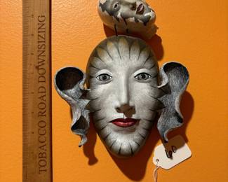 A60 - $125. Peggy Bjerkan: Mask Woman "Bird Girl Dreams". Measures 6" x 8". 
