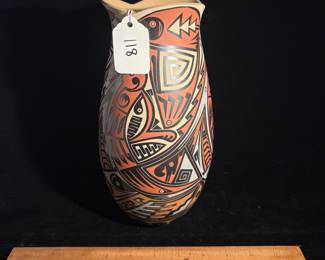 A118 - $30. Jesus Ortiz (Mata Ortiz) HAS CRACK - Tetrachrome Ceramic Jar. Measures 4.5" x 10" tall. 