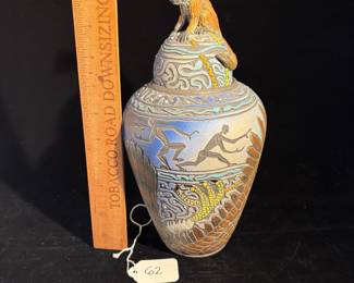A62 - $200. Jef Raasch: Figural Vase with Monkey Lid. Measures 6" x 10.5" tall.