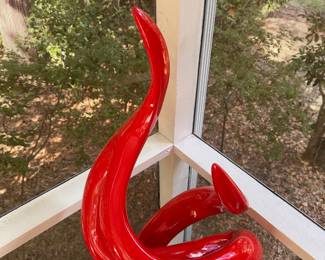 P669 - $375. Tall Red Acrylic Sculpture. Measures 19" wide x 42" tall. Signed. Illegible. Has been used on screened in porch. 