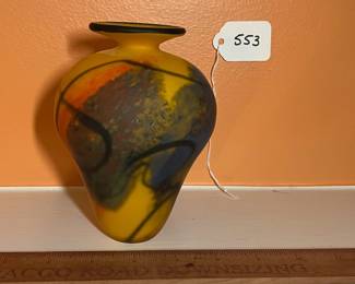 A553 - $35. Signed Art Glass Vase. Illegible. Measures 4" x 6" tall. 