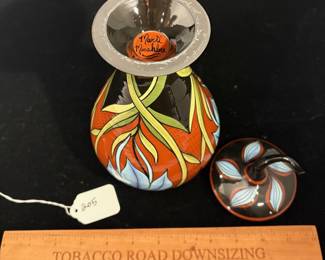 A205 - $75. Marti Mocahbee : Pottery Jar with Lid. Measures 5.5" x 9.5" tall. 