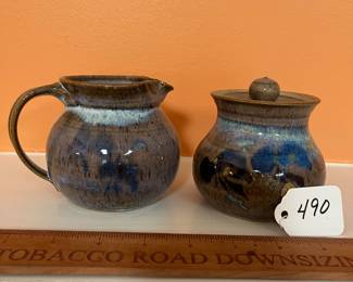 A490 - $20. Pottery Cream and Sugar Set. Craig? Measures 3.75" tall. 