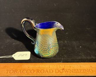 A227 - $85. Gilvey Fish Scale Art Glass Pitcher. Measures 5" x 4" tall. 