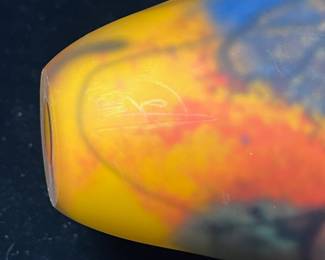 A553 - $35. Signed Art Glass Vase. Illegible. Measures 4" x 6" tall. 