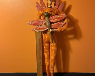 A106 - $100. TP Speer and Deborah Banyas: Set of Clay Dolls. Orange on measures 8" x 20.5" tall. Green one measures 9" x 25" tall. 