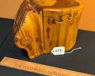 A603 - $50. D. Rupard Wooden Puzzle Box. Measures 6.25" w x 9.5" d x 7" tall