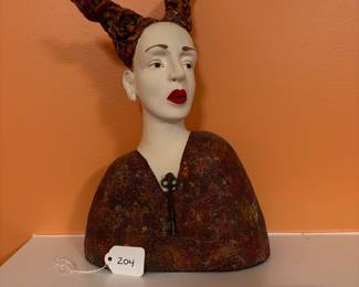 A204 - $275. Kirsten Stingle : Woman's Head Sculpture. Measures 9.5" x 4" x 15" tall. 