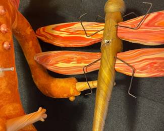 A106 - $100. TP Speer and Deborah Banyas: Set of Clay Dolls. Orange on measures 8" x 20.5" tall. Green one measures 9" x 25" tall. 