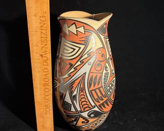 A118 - $30. Jesus Ortiz (Mata Ortiz) HAS CRACK - Tetrachrome Ceramic Jar. Measures 4.5" x 10" tall. 
