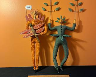 A106 - $100. TP Speer and Deborah Banyas: Set of Clay Dolls. Orange on measures 8" x 20.5" tall. Green one measures 9" x 25" tall. 