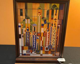 A599 - $100. Frank Lloyd Wright Saguaro Forms and Cactus Flowers stained glass art panel. Measures 12.25"w x 15.75" tall