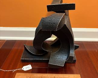 A292 - $4,750. Rich Arfsten : What Goes Around Comes Around. Measures 12" x 13" x 13.5" tall. 
