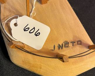 A606 - J. NotoA606 - $65. J. Noto Wooden House Sculpture. Measures 20.25"w x 4.25"d x 10.25" tall