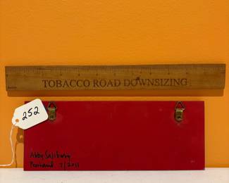 A252 - $100. Abby Salisbury: Sgraffito Wall Plaque. Measures 10" x 4". 