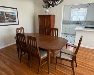 Mid-century walnut table with 6 chairs, seats reupholstered