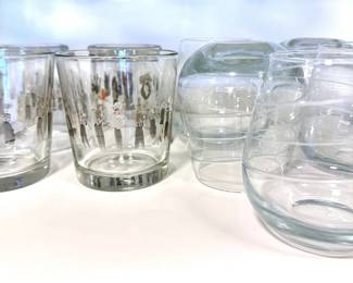 2 Sets Of Glassware, 4 Libbey Club Cumming Dancers Designed By Alan Cumming & 5 Etched Stemless Wine-glasses Lot #: 52