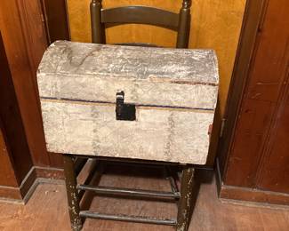Antique wallpaper covered trunk 
