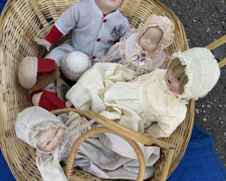 Lot 39: Basket Of dolls