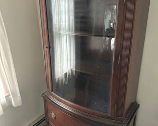 Lot 108: Dark wood corner display cabinet with glass doors and bottom drawer
