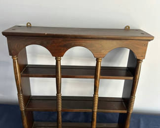 Lot 14: Wooden wall shelf with arches and turned posts