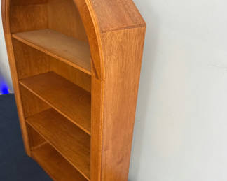 Lot 15: Arched wooden bookshelf