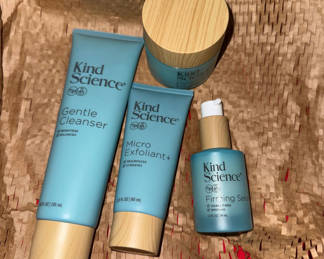 Lot 63: Kind Science skincare set with cleanser, exfoliant, serum and jar