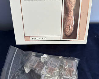 Lot 32: GloPRO Microneedling Rejuvenation Tool with Replacement Heads