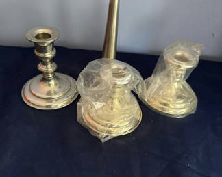 Lot 49: Three silver-plated candlesticks with a matching serving plate