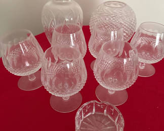 Lot 131: Etched crystal glassware set: goblets,ashtray , and decorative vases
