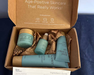 Lot 33: Kind Science skincare kit with cleanser, serum, exfoliant, and cream