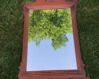 Lot 200: Decorative wooden-framed mirror with eagle crest 38.5x25